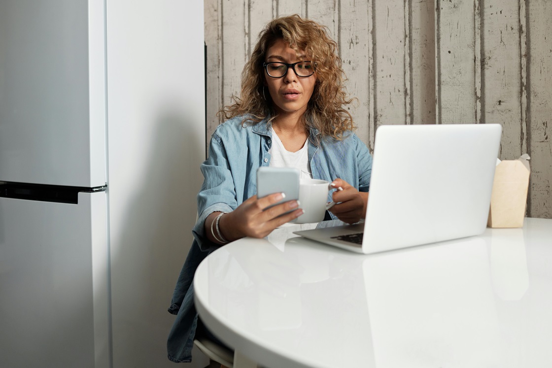 small business owner working on business safety tips on her computer