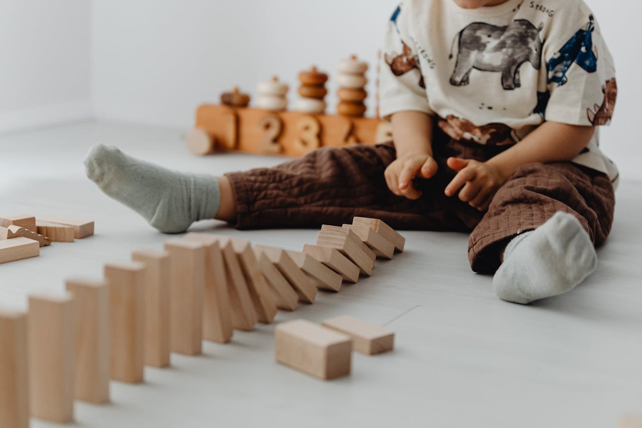 child with Autism playing with blocks