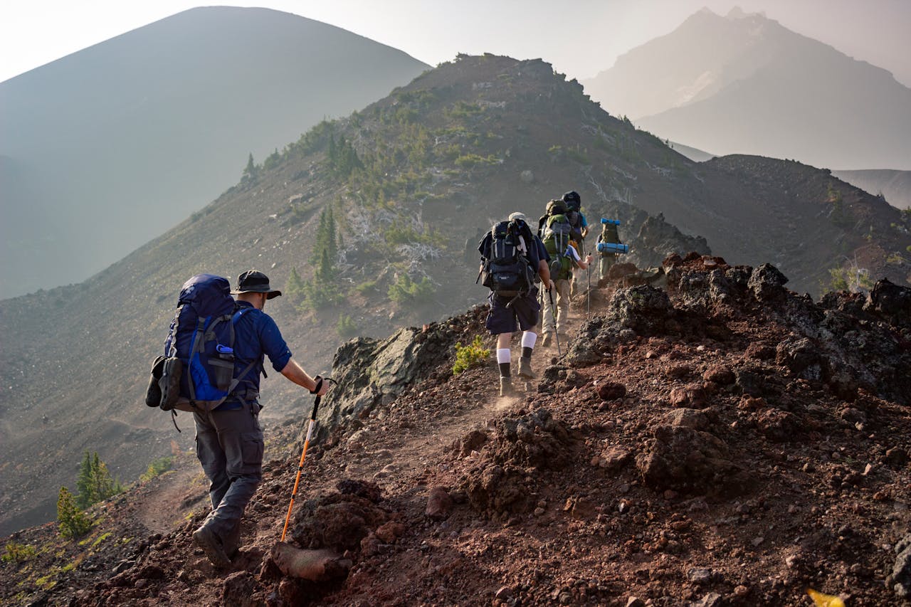 family listening to outdoor safety tips while hiking